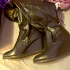 Thigh high black boots